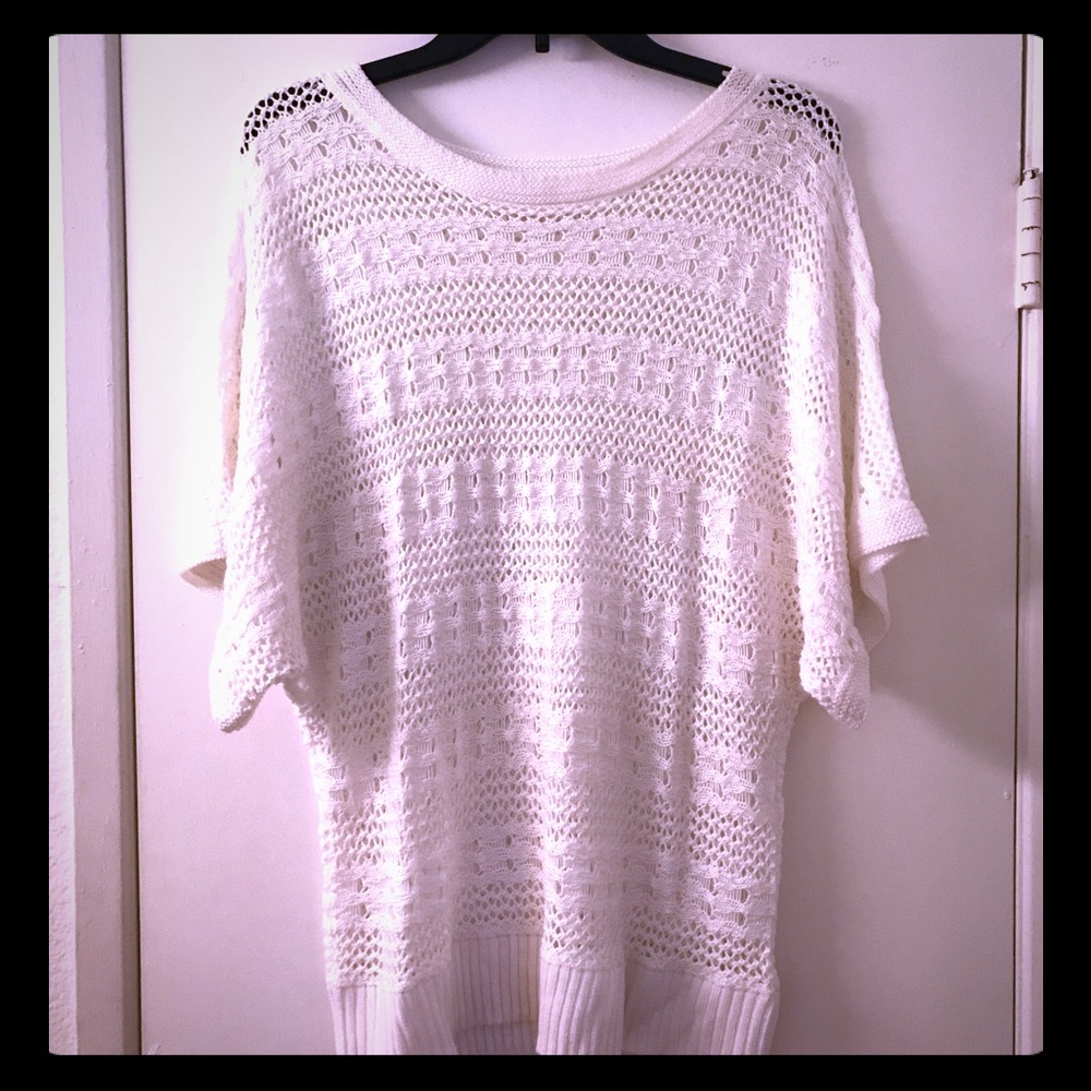 Ladies white sweater.