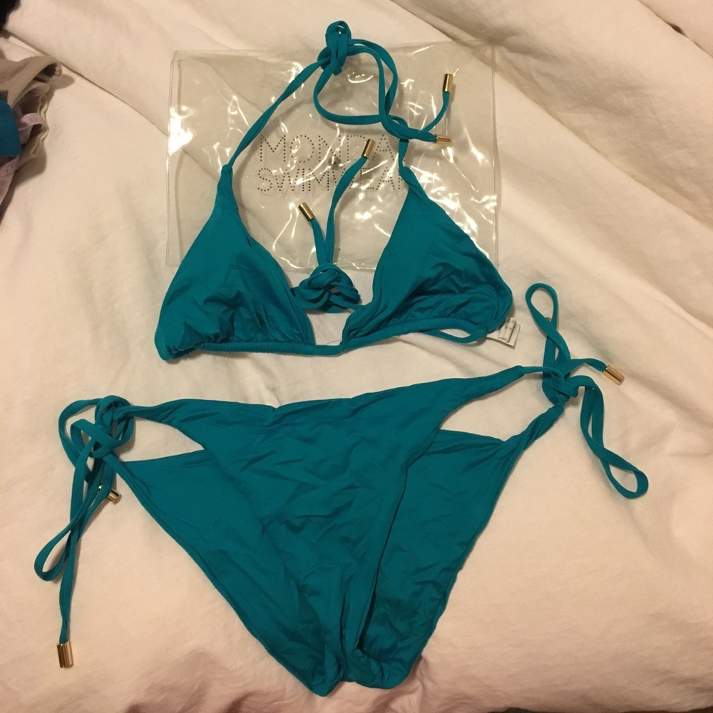Monday swimwear blue bikini w/ plastic. Worn once!