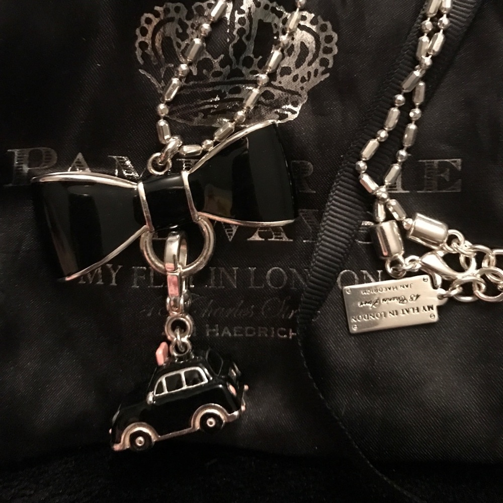 My flat in London bow necklace with bag Brighton