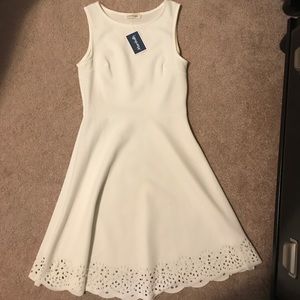 White dress with floral cutouts