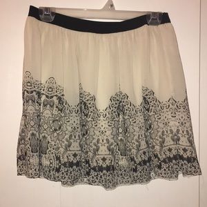 Cute cream colored flowy skirt