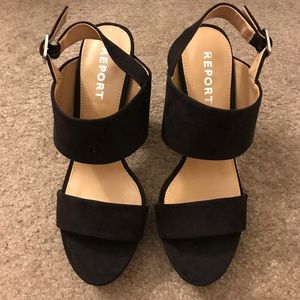 Women's black suede high heel sandals.
