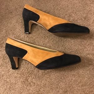 Two tone navy and taupe suede pumps.