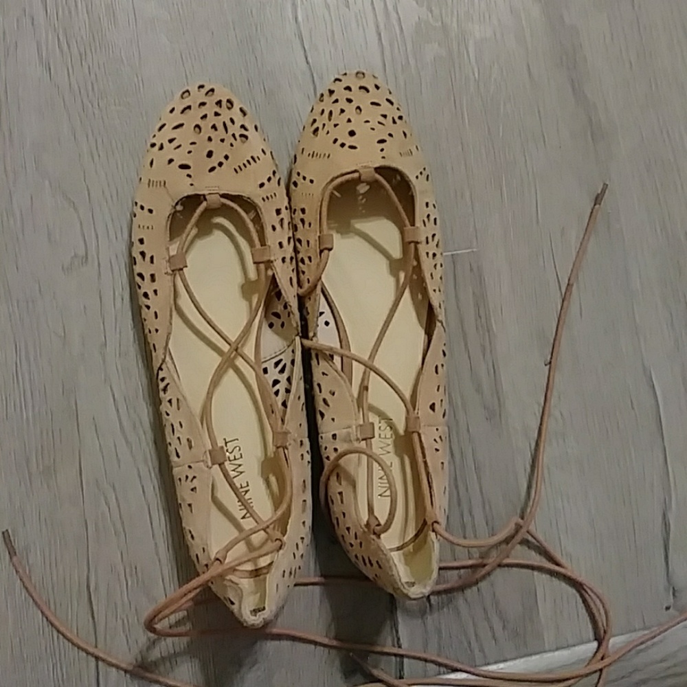 Pale pink Nine West tie up flats