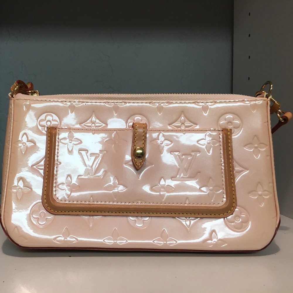 Light pink Louis Vuitton Mallory Baguette purse