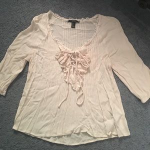 Flowing white lace-up top