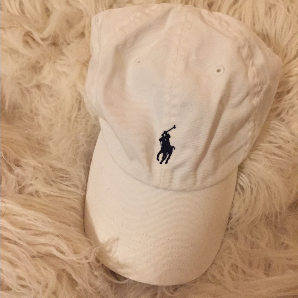 White and black Polo hat. Leather strap