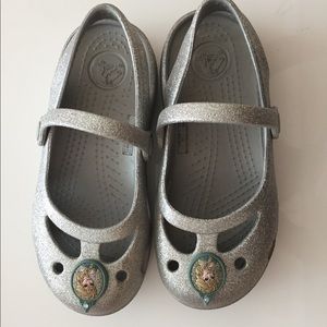Girls crocs with removable Elsa gibitz.