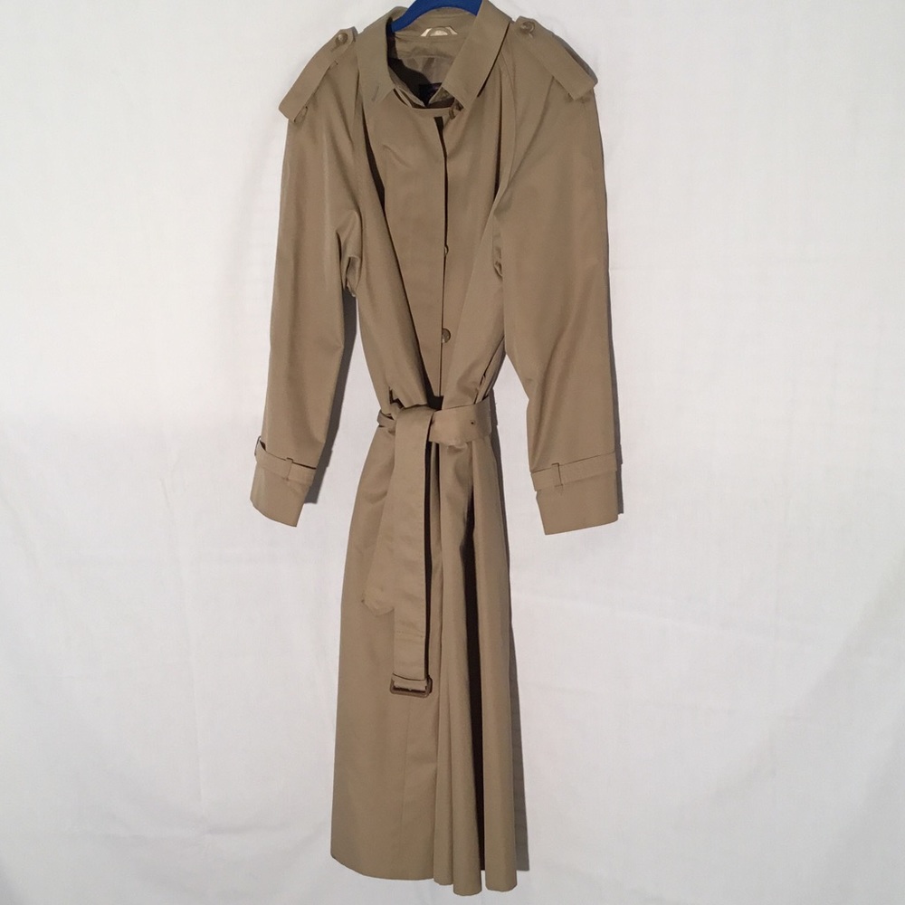 Women's khaki trench coat in perfect condition .