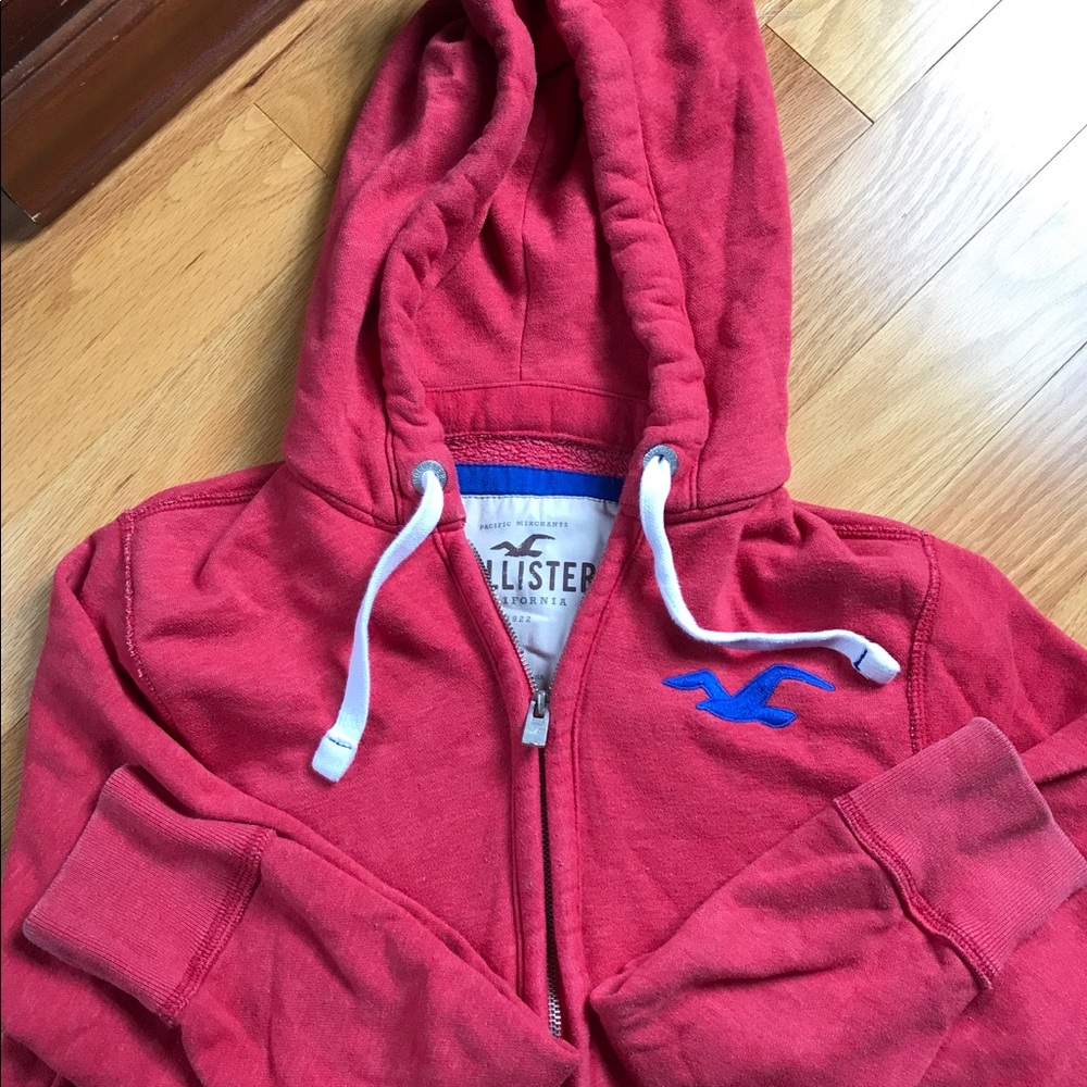 Men's red Hollister zip up hoodie.