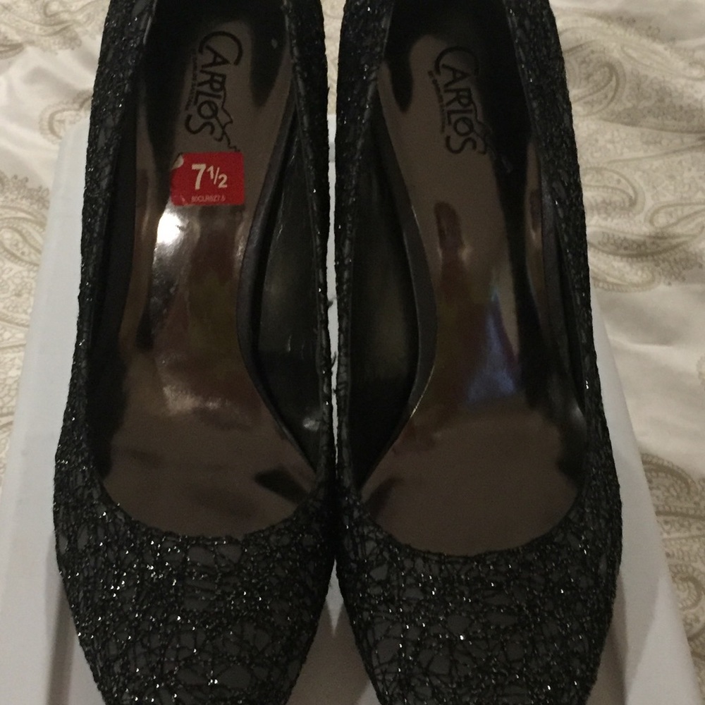 Carlos Santana Black heels