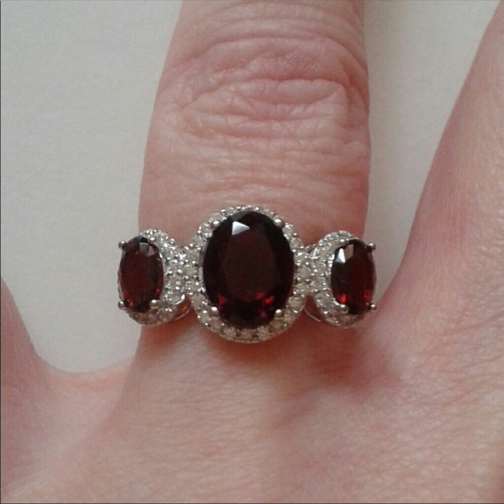 Size 7 three stone ring with garnets and diamonds
