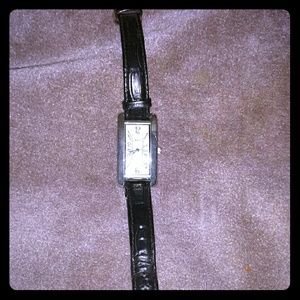 Watch with black strap