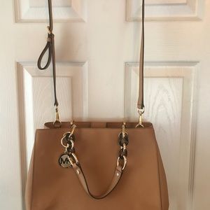Michael Kors bag.  Light golden brown