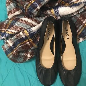 Black leather ballet flats