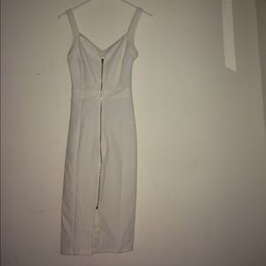 Mini white dress with crossed back straps