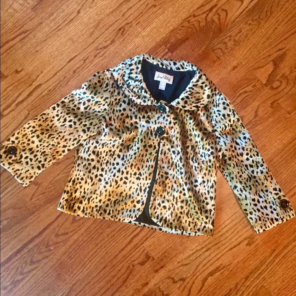 Cropped evening jacket.
