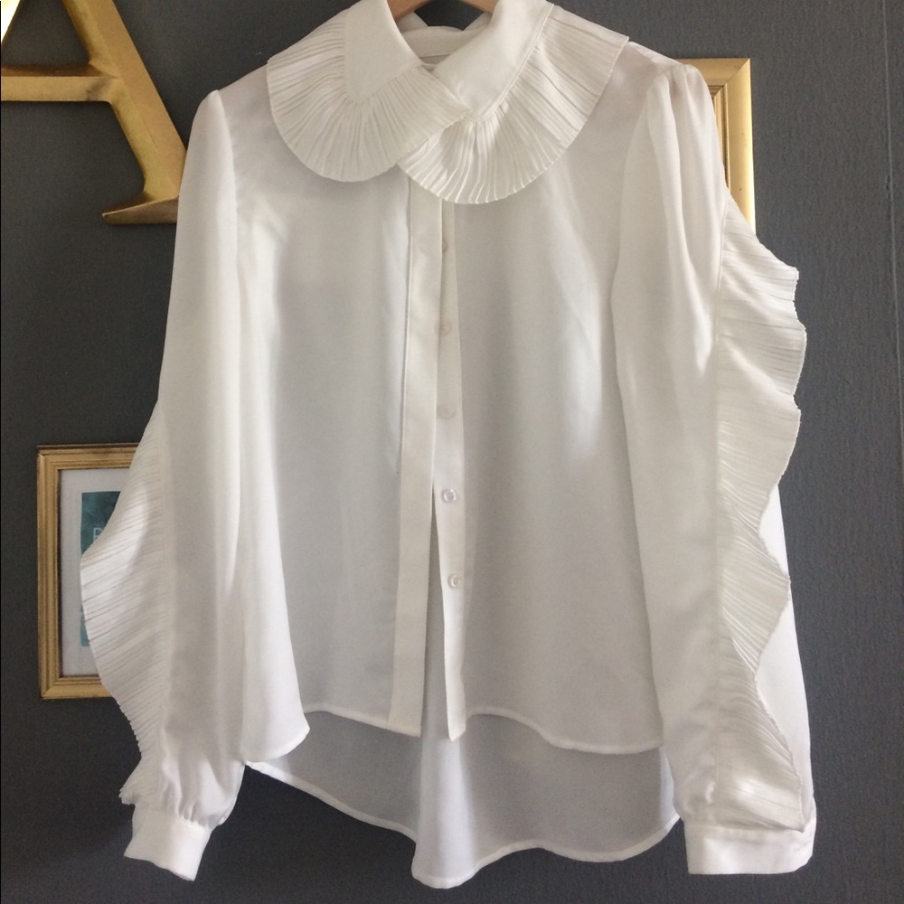 High fashion raffle blouse