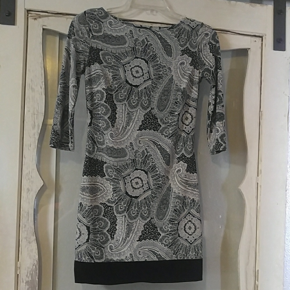 Knee length dress with 3/4 sleeve.  Size 2