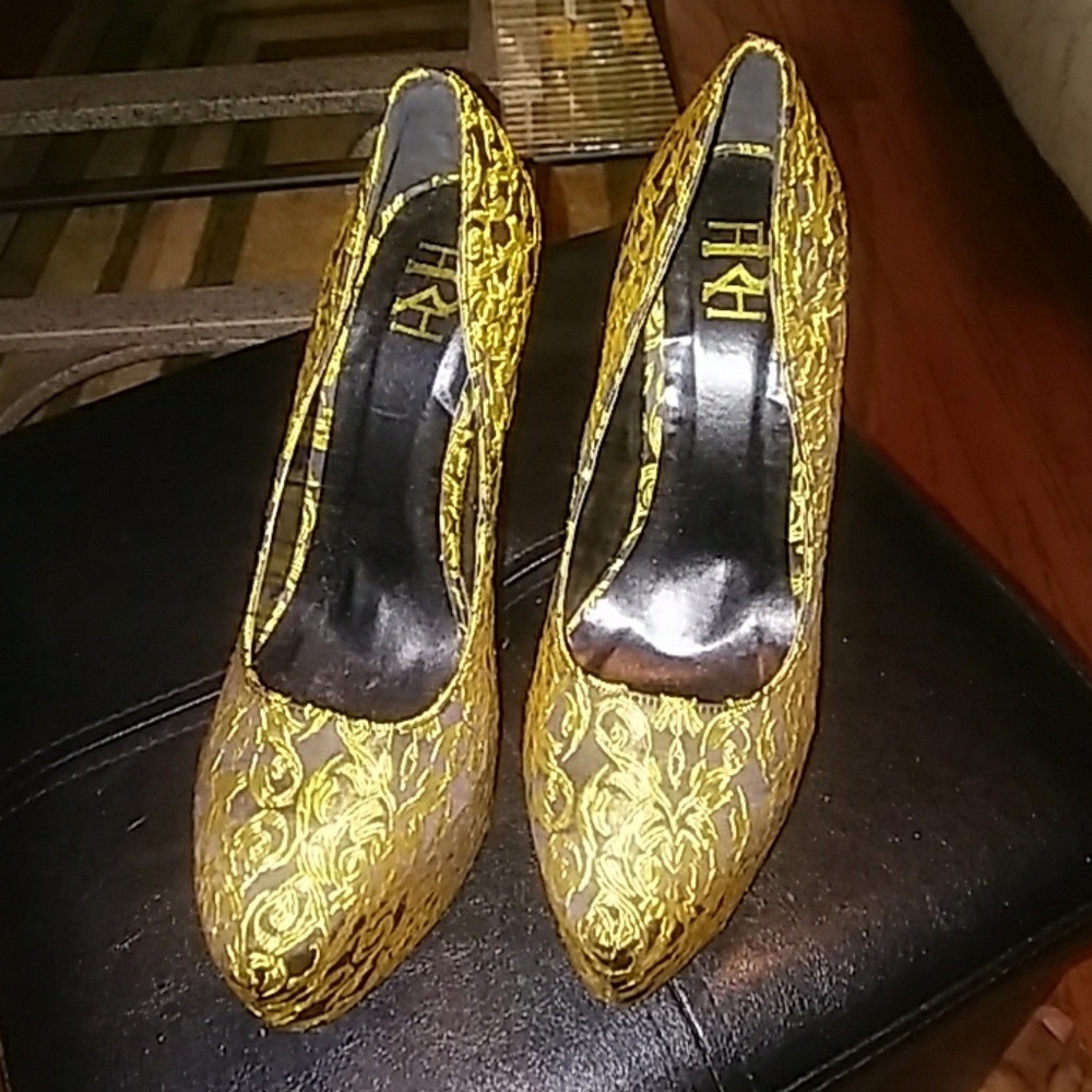 Size 7 gold and black stiletto heel
