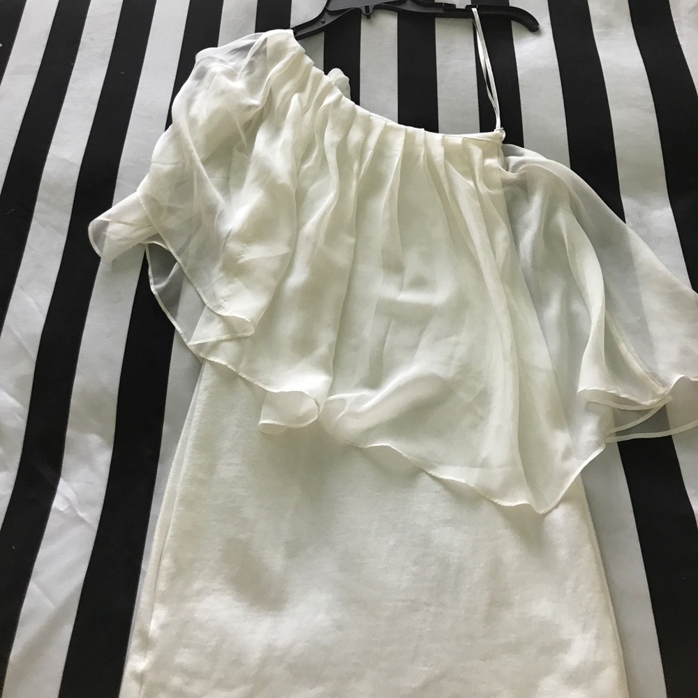 Cream color. One shoulder dress