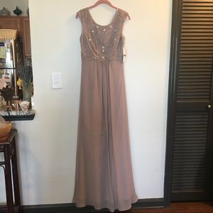 Formal beaded gown. New with tags