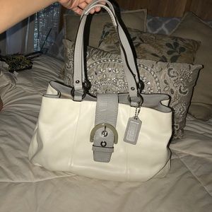 White and grey coach handbag