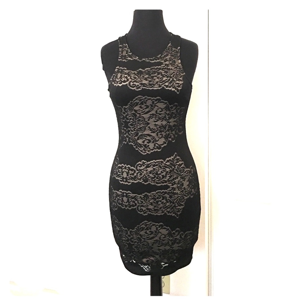 Little black dress lined with lace-type design