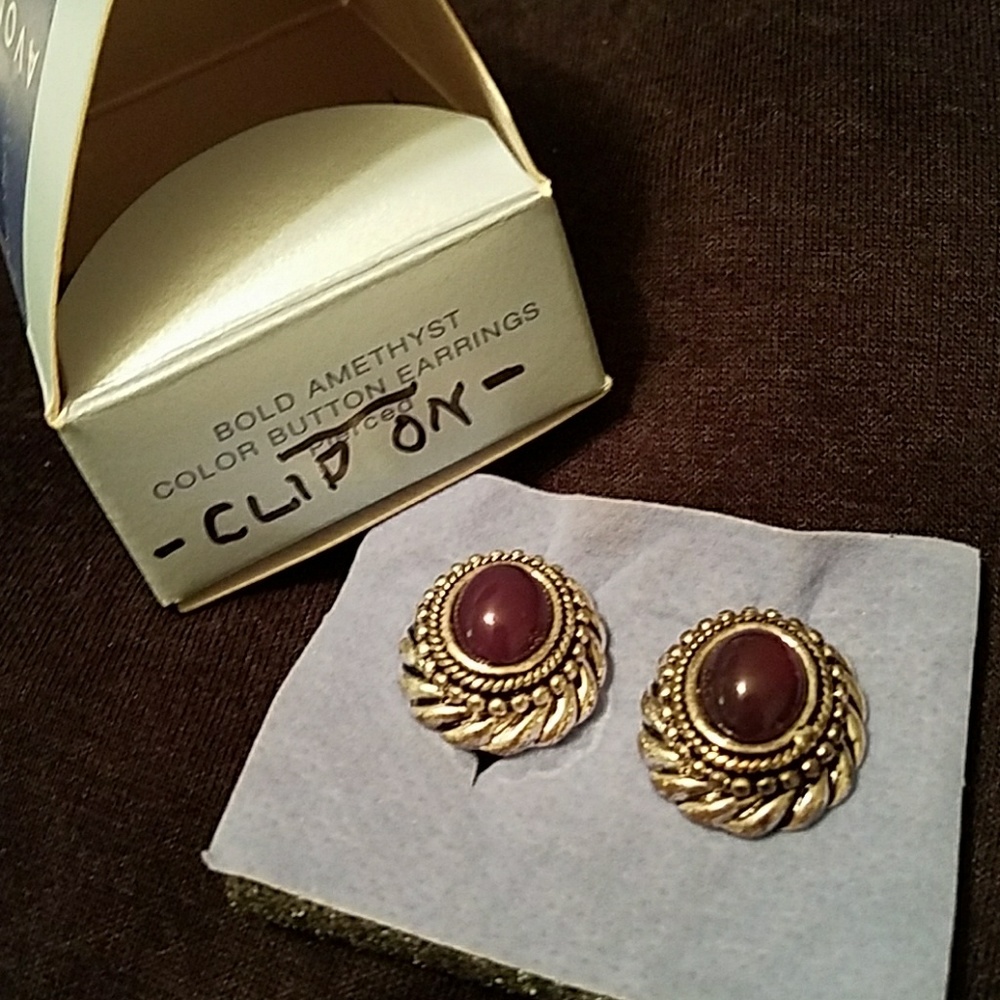 Silvertoned dark amethyst color clip on Avon NIB