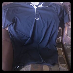 Oakley black polo.