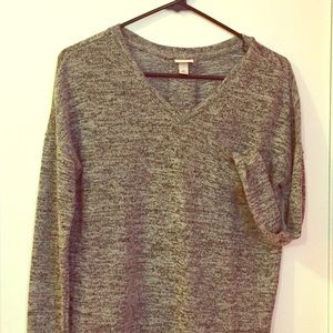 Grey textured v-neck sweater.