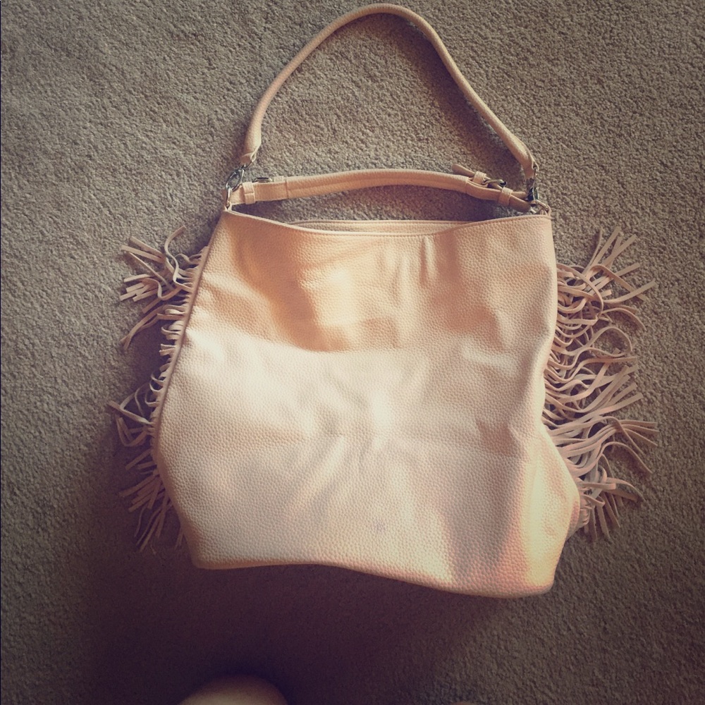 Light pink leather and fringe purse