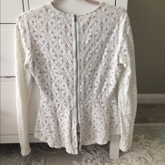 BCBGMaxAzria Tops - Long sleeved, peplum top. BCBGMaxAzria Tops - Long sleeved, peplum top.