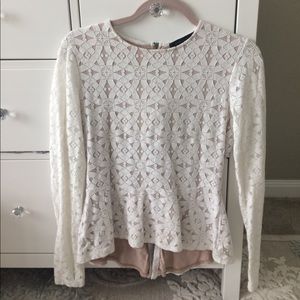 BCBGMaxAzria Tops - Long sleeved, peplum top. BCBGMaxAzria Tops - Long sleeved, peplum top.