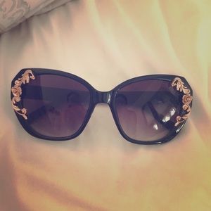 Black and gold sunglasses