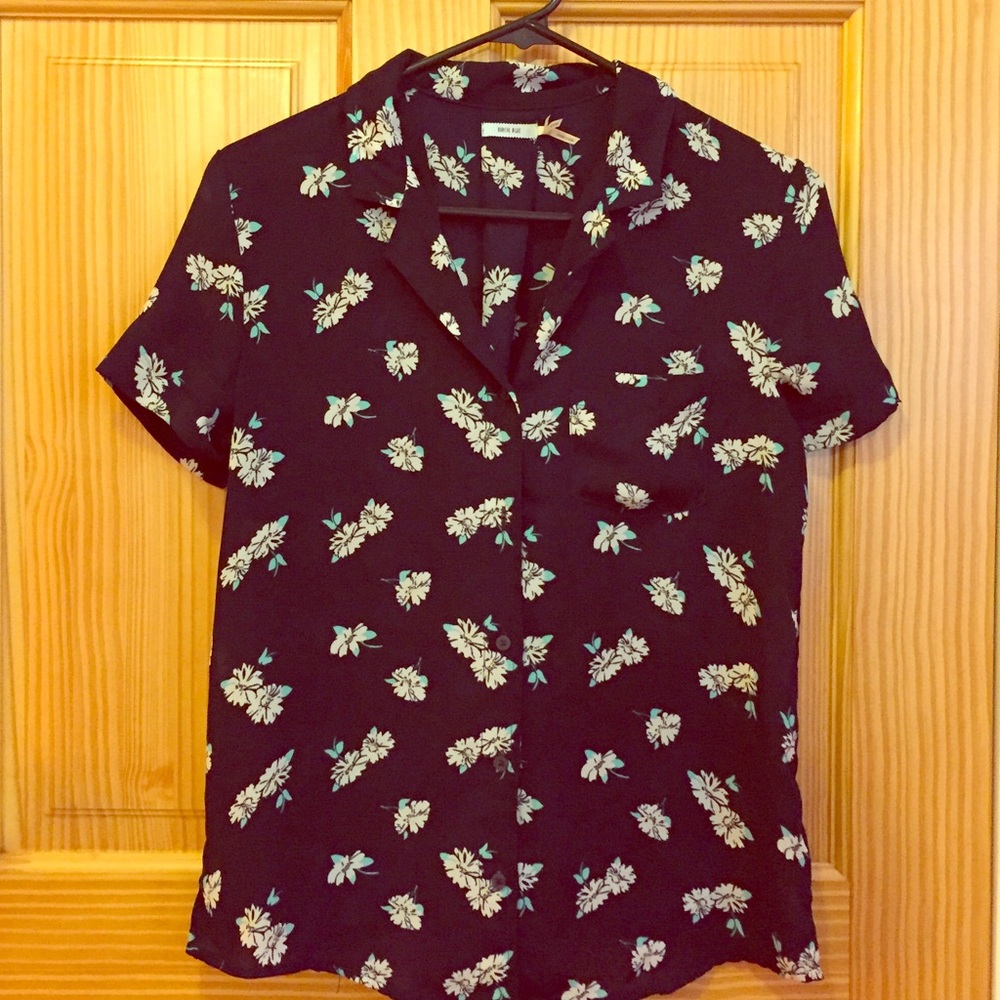 Navy blue button down with flower details.