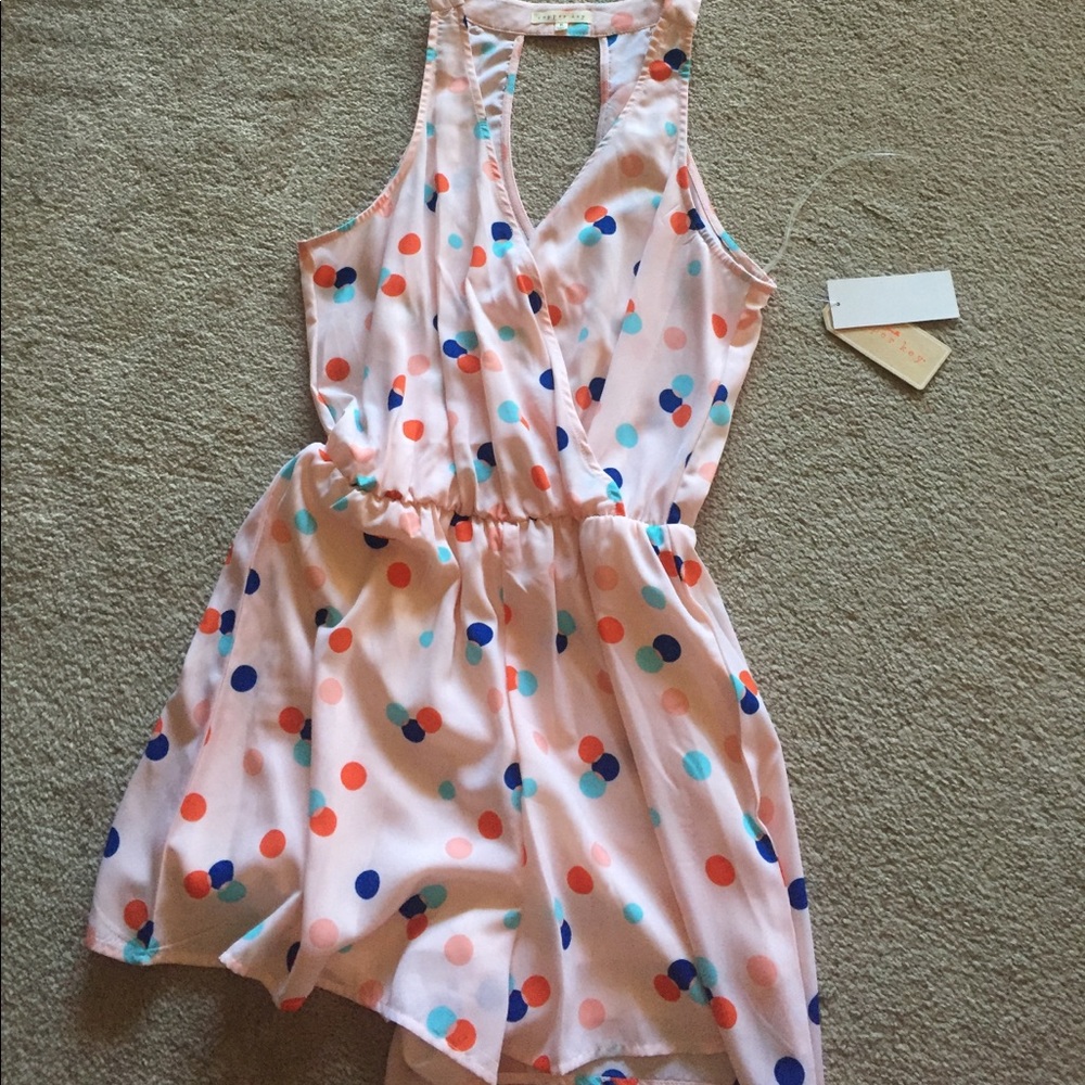 Adorable pink and polka dot romper