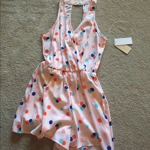 Adorable pink and polka dot romper