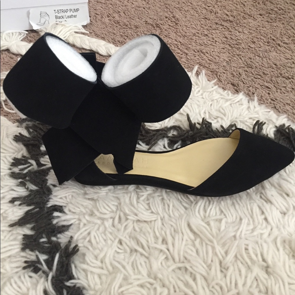 Black flats with a bow
