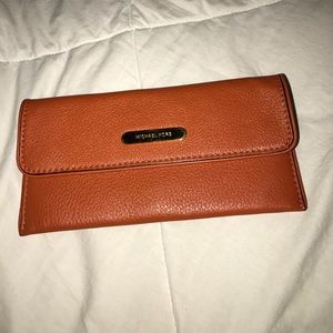 Burnt orange Michael Kors wallet