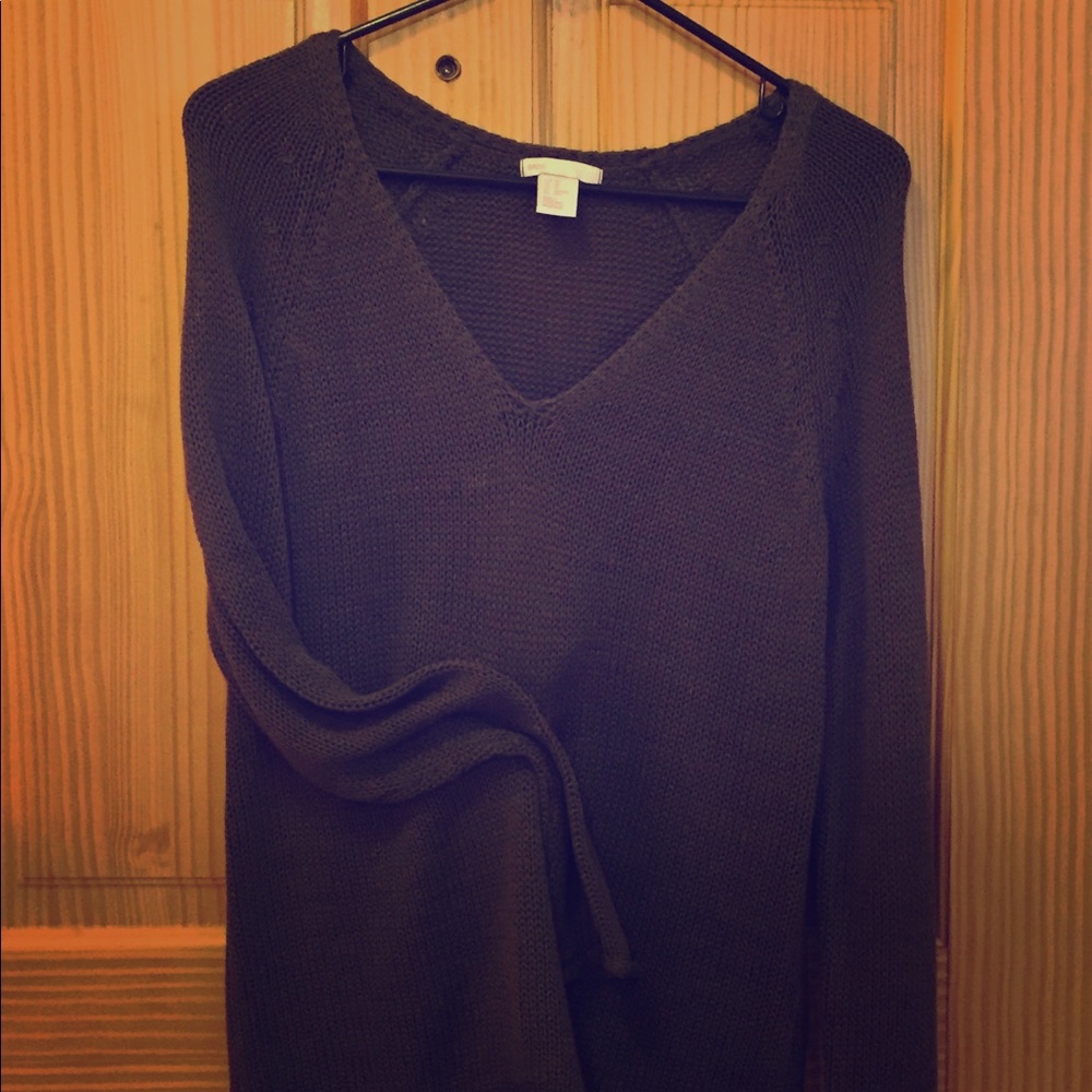 Army green v-neck sweater.