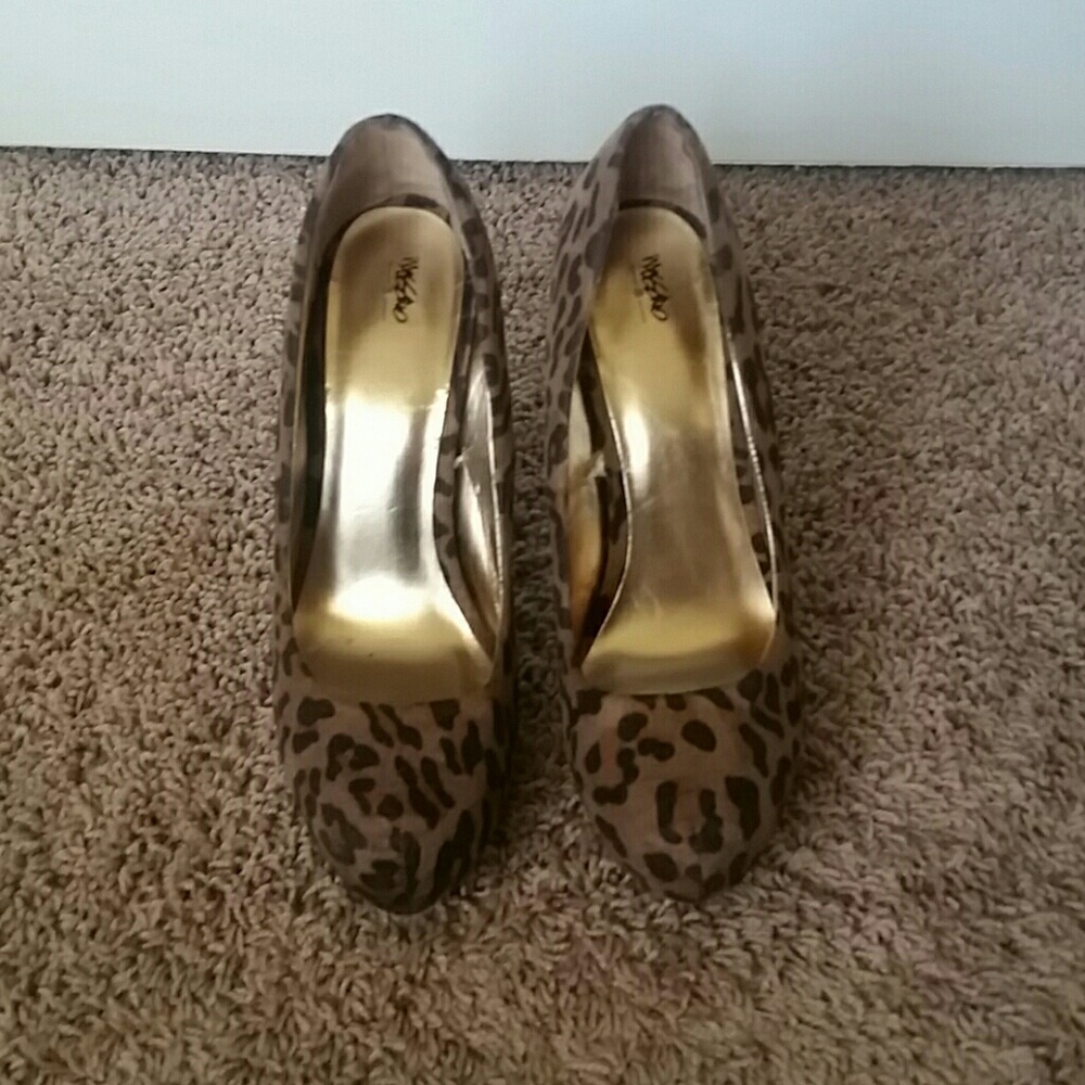 Cheetah print platform pumps