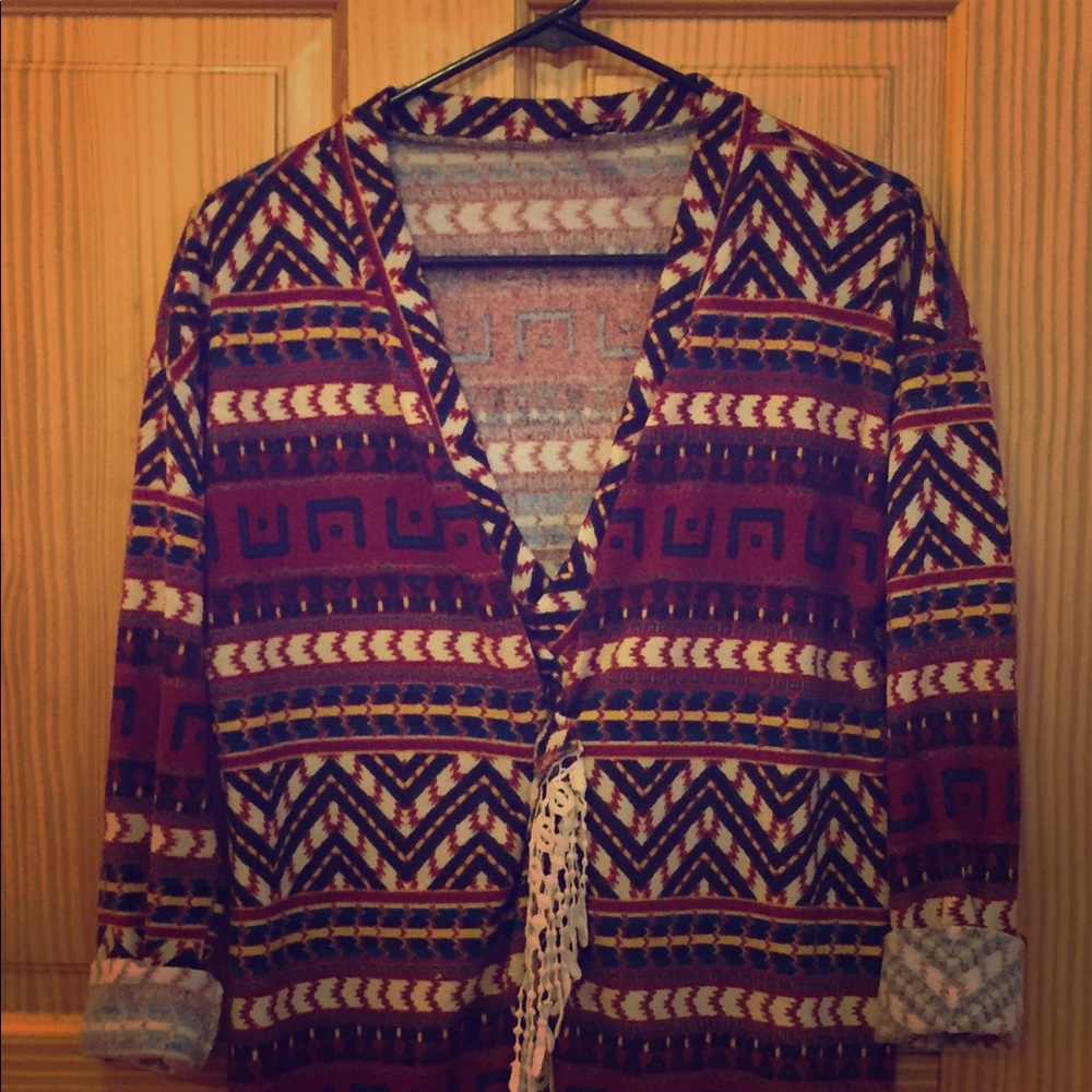 Neutral colors open sweater.
