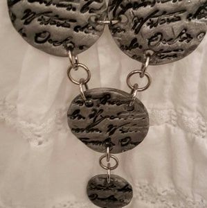 Beautiful handmade necklace in plastic ceramic.