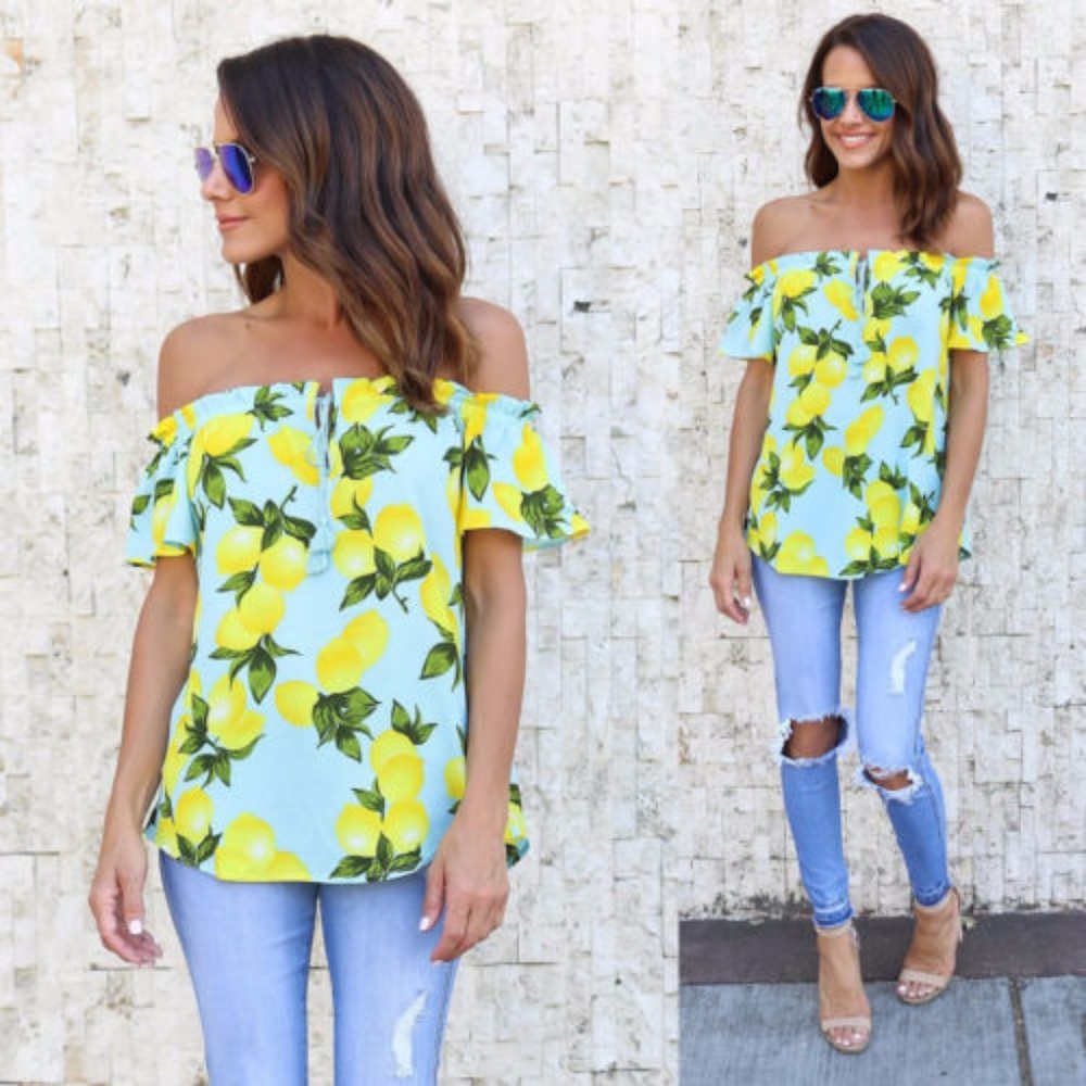*sold*Sky Blue top with yellow floral pattern NWOT