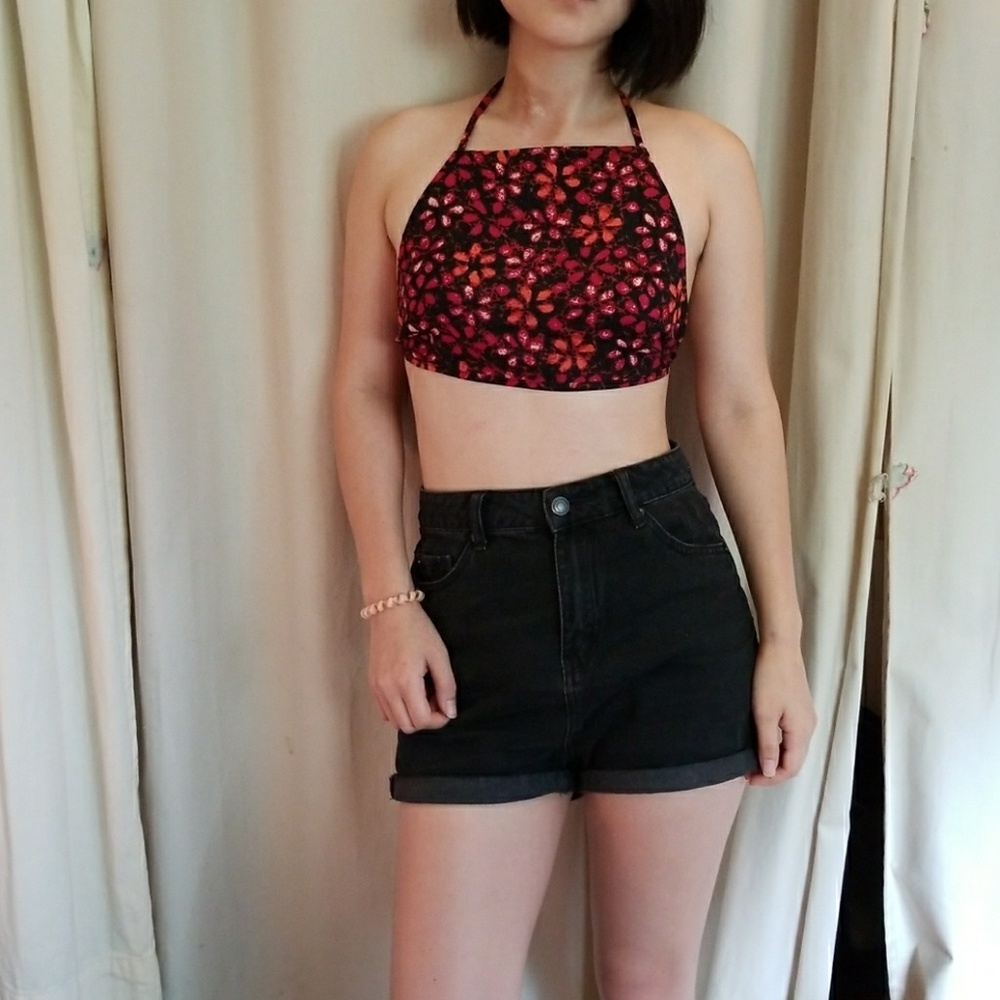 Urban outfitters red flower black crop top.
