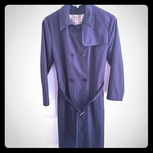 Paddington Exchange woman raincoat