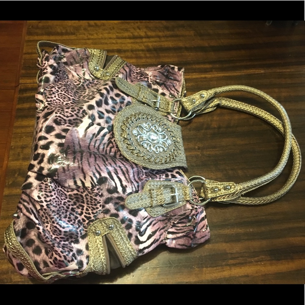 Purple cheetah print handbag