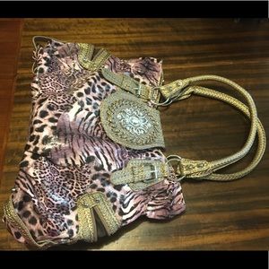 Purple cheetah print handbag