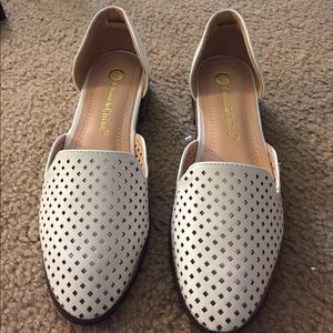NWT Gorgeous white perforated flat mules